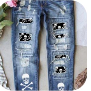 Deconstructed jeans with skulls